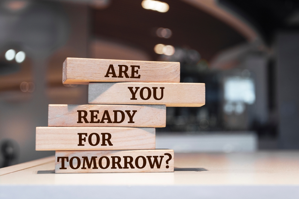 Stacked wooden blocks with the words “Are you ready for tomorrow?” symbolizing preparation for the future of education.