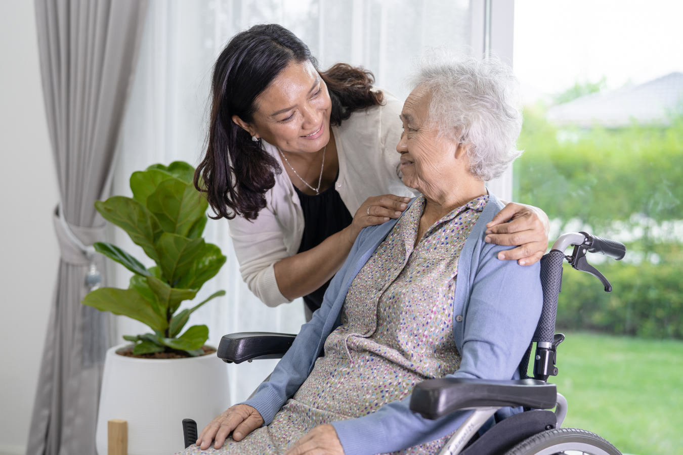 An adult woman and her Mother bond together at the Mother's home - a Residential Care facility.