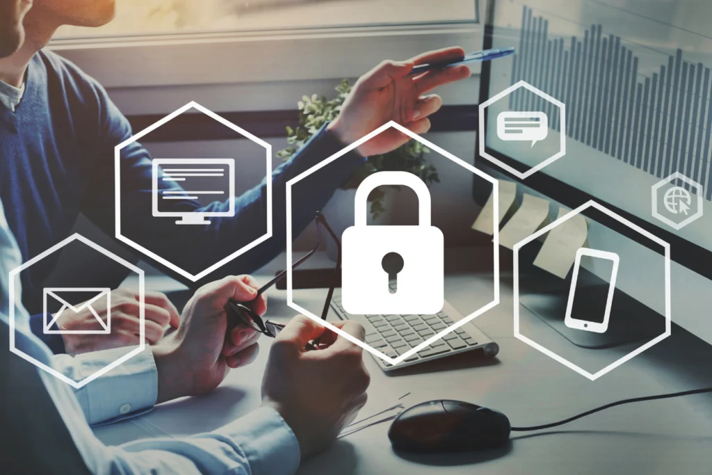 Finance professionals reviewing data dashboards with a cybersecurity lock icon, representing Great Plains end-of-life security and compliance risk.